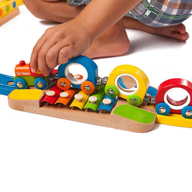 hape musical rainbow railway