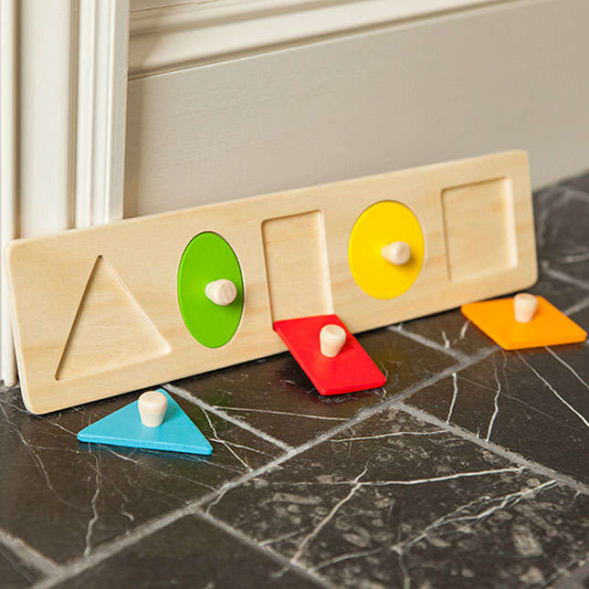 Let's Learn Shapes! Wooden Puzzle is an essential learning experience for all children!