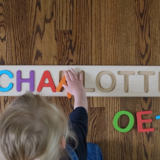 Childrens Handcrafted Wooden Name Puzzle with pegs 